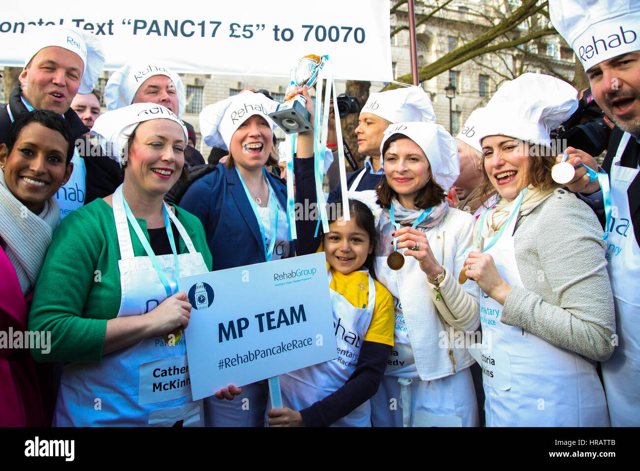 Victoria Tower Gardens, London, UK. 28th Feb, 2017. The winning team - MPs won the race. Lords, MPs and members of media teams take part in pancake race - celebrating 20 years of flipping for Rehab charity and its work with disabled people. Credit: Dinendra Haria/Alamy Live News Stock Photo