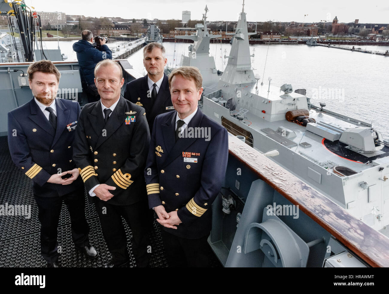 Kiel, Germany. 28th Feb, 2017. Marco Taedcke (l-r), the captain of the German frigate Augsburg, Francois Roux, captain of the South African frigate Amatola, Jobst Berg, captain of the German auxiliary ship Bonn and Volker Herbert Blasche, task for director of the Good Hope VII naval exercise on the Bonn in the harbour of Kiel, Germany, 28 February 2017. The joint German-South African naval war game in the Baltic Sea will conclude on the 13.03.17. Photo: Markus Scholz/dpa/Alamy Live News Stock Photo