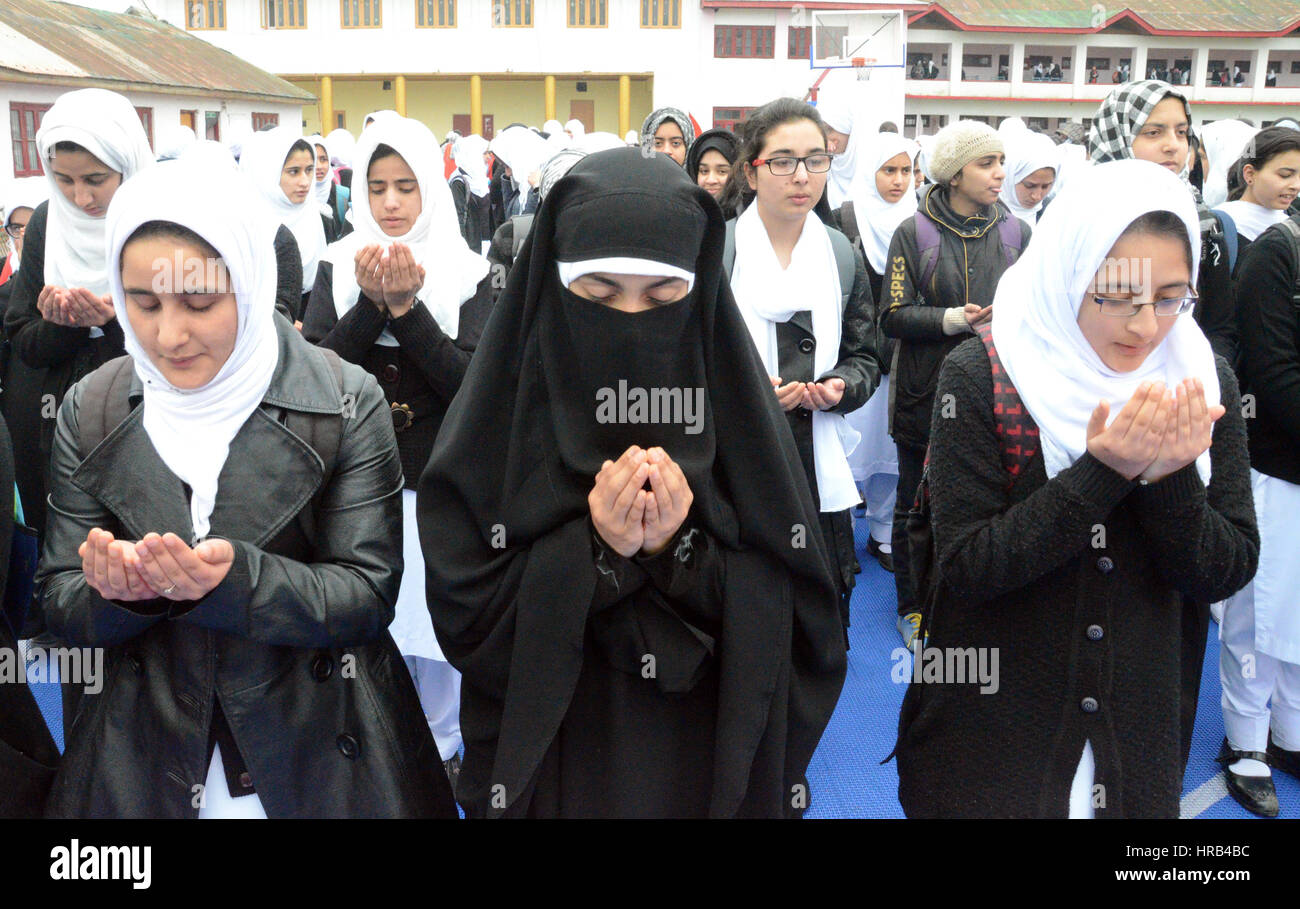 Srinagar, Kashmir. 1st Mar, 2017. Schools college girls attends morning prayers at school compound on the first day of school, during All government & private school reopening on 1 March after a long break including winter vacation & six months summer unrest in Kashmir. Credit: Sofi Suhail/Alamy Live News Stock Photo