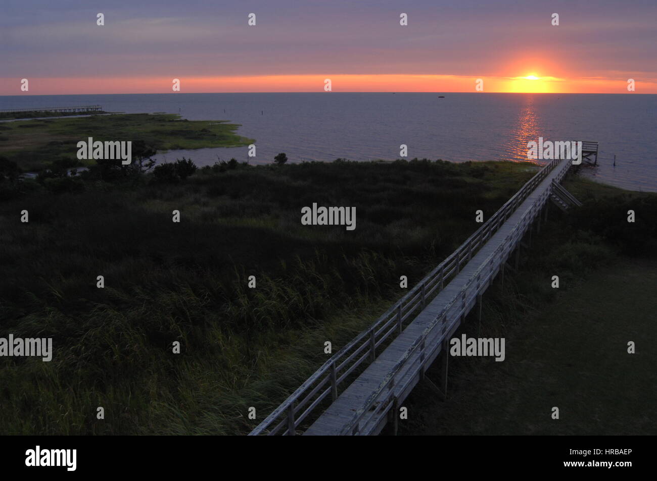dramatic sunset over fishing pier Pamlico Sound, Outer Banks, North Carolina Stock Photo Alamy