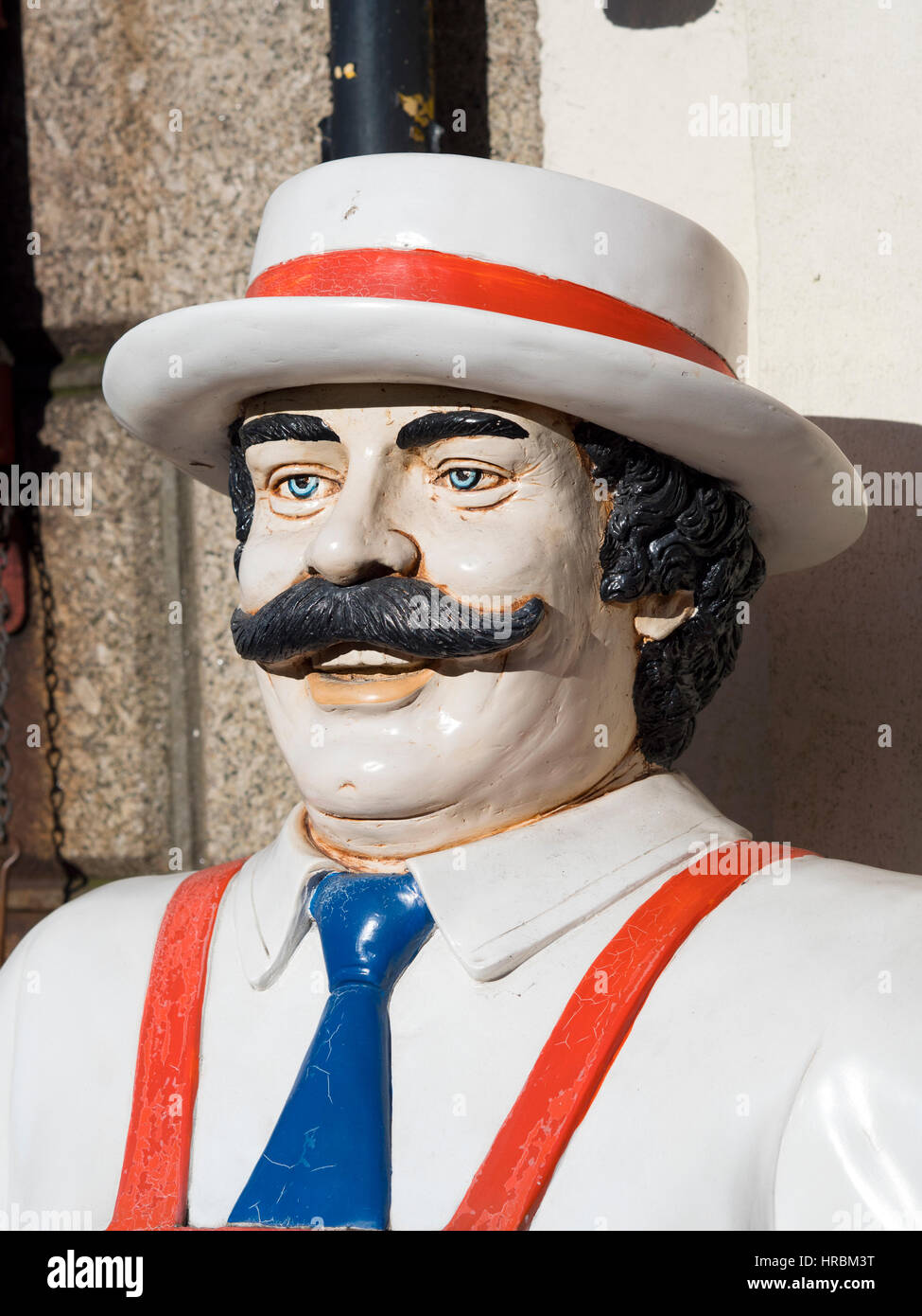 Traditional butchers mannequin close up, outside a high street butcher shop in Camborne, Cornwall England. Stock Photo