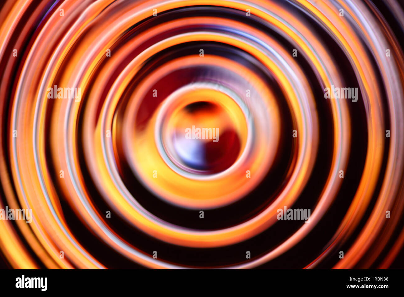 Black - orange abstract background with defocused concentric circles Stock Photo