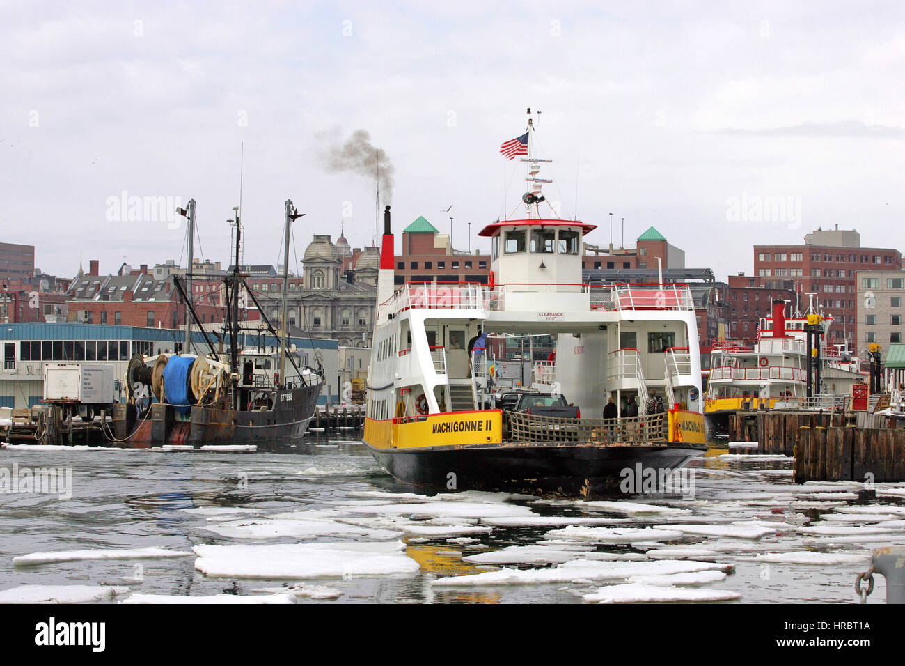 Casco Bay Ferry Portland Harbor winter ice Portland Maine New England USA Stock Photo