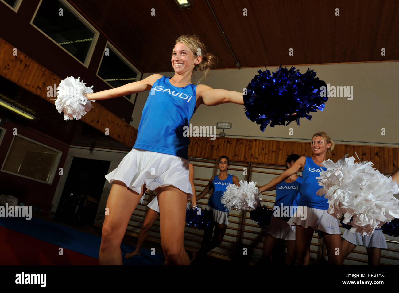 Young cheerleaders team training in the gym Stock Photo Alamy