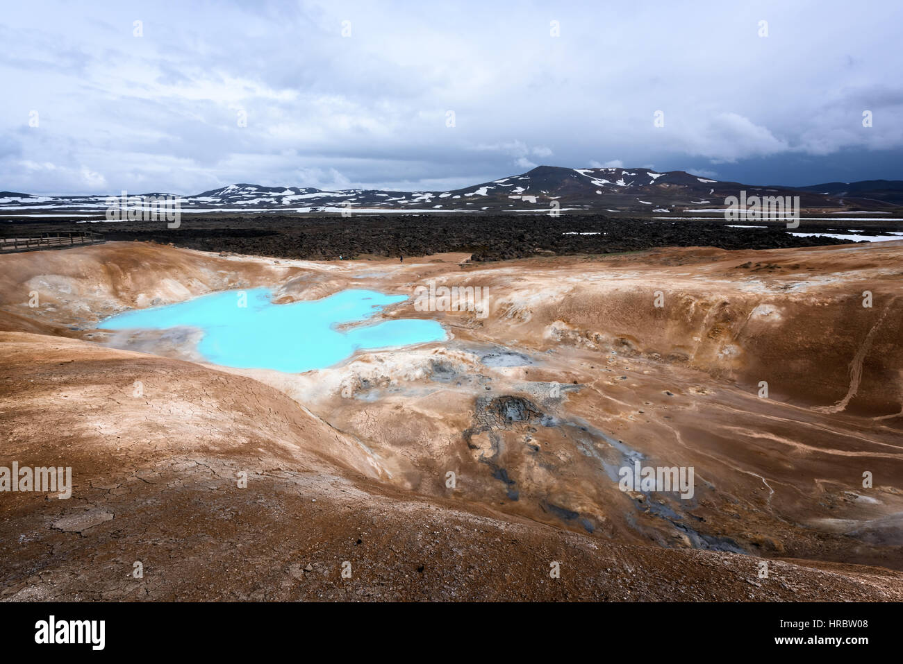 Acid hot lake in the geothermal valley Leirhnjukur, near Krafla volcano, Iceland, Europe. Stock Photo