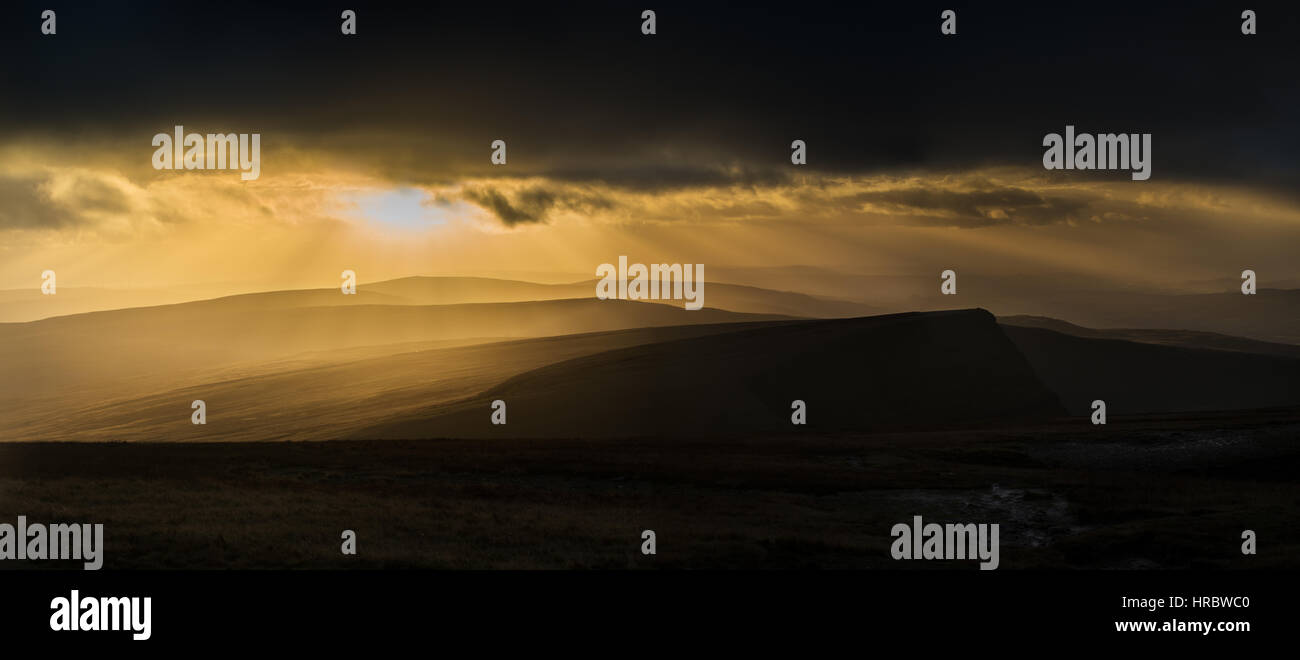 Autumn Sunset over Picws Du overlooking Llyn y Fan Fach in the Carmarthen Fans, Brecon Beacons National Park, Wales UK Stock Photo
