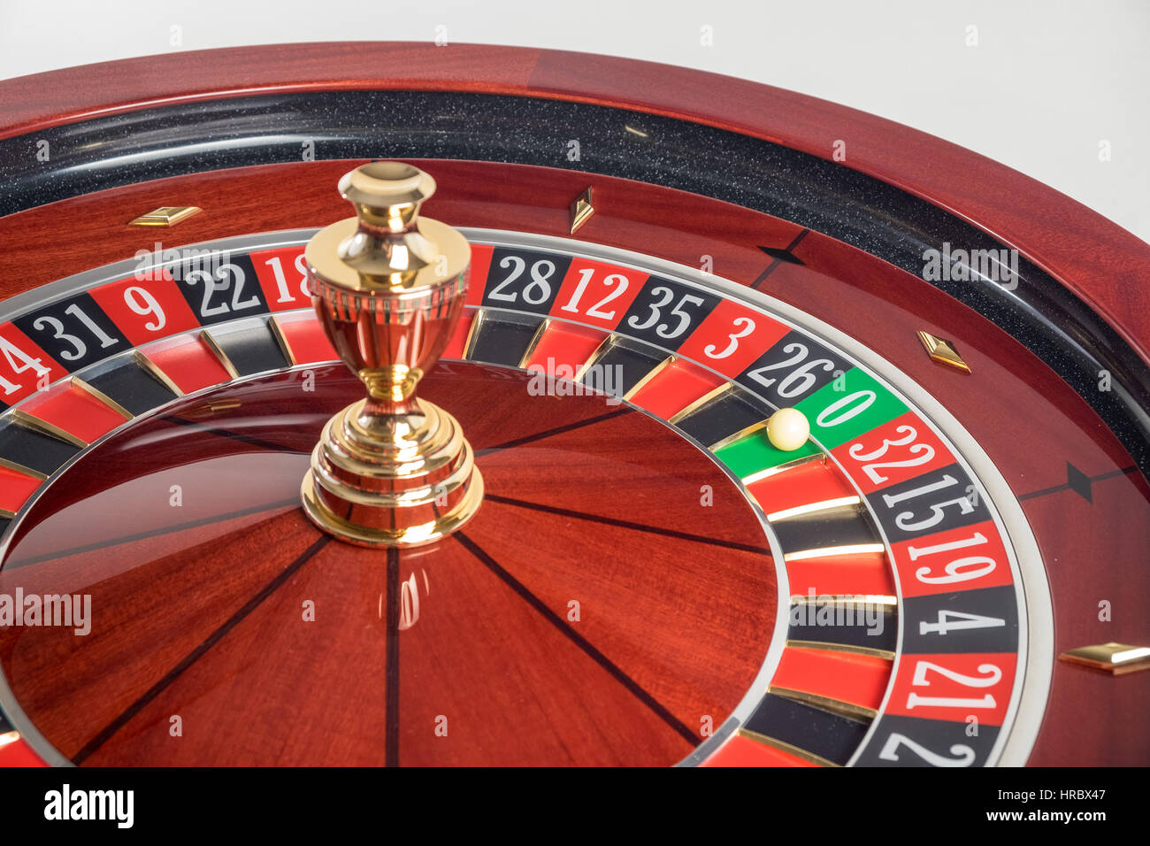 Casino Roulette Wheel stopped at zero Stock Photo