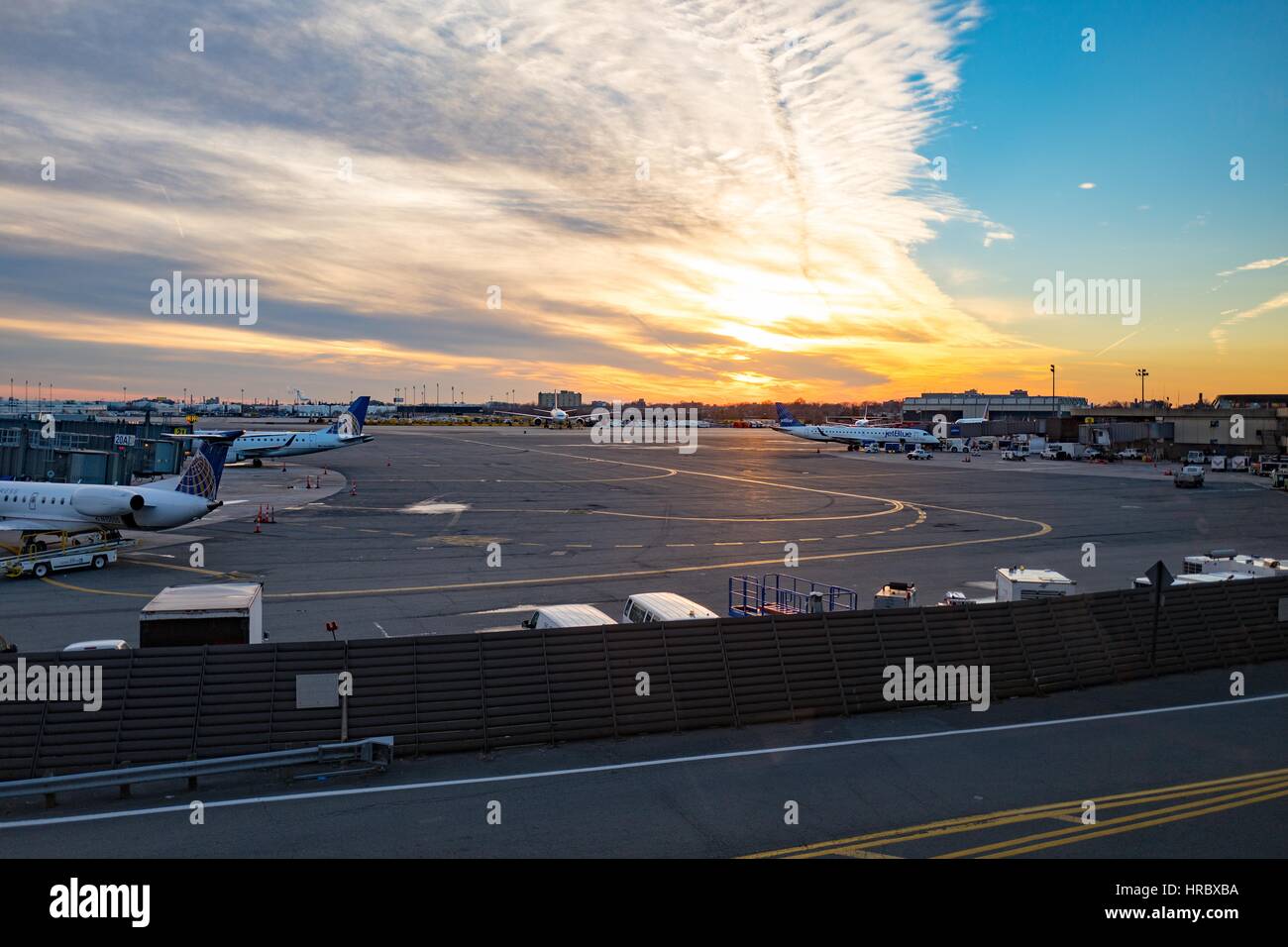 Sunset over the tarmac at Newark Liberty International Airport, Newark, New Jersey, December 8, 2016. Stock Photo