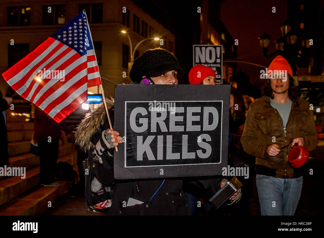 New York, USA. 28th Feb, 2017. Thousands of people gathered at Congressional offices and at town squares across the country to respond to Trump's first address to a joint session of Congress tonight with their own People's Address. In New York City the People's Address event was held at Brooklyn Borough Hall with a 'Cacerolazo!', a form of protest popular in Latin American countries, that consists of a group of people making noise by banging pots, pans and utensils to express dissent (in this case) to Trump's speech that will undermine communities. Credit: PACIFIC PRESS/Alamy Live News Stock Photo