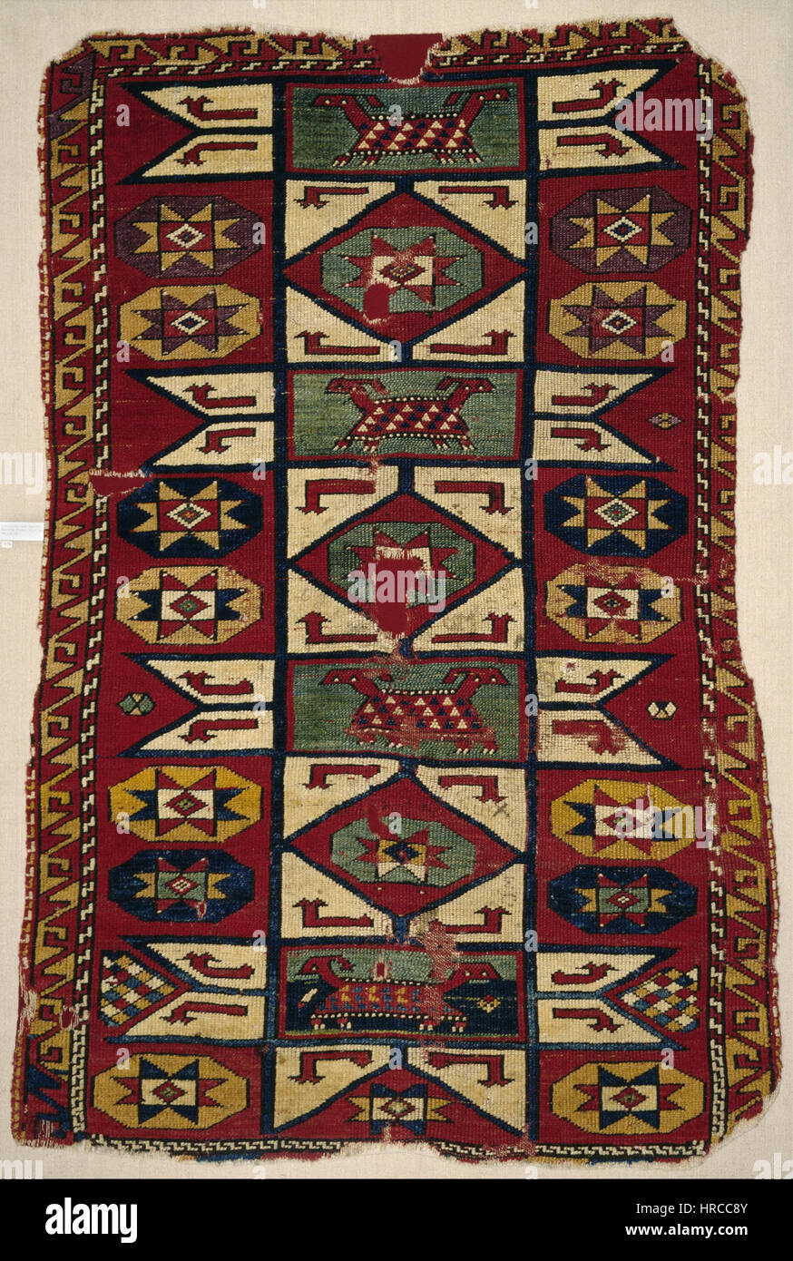 This rug featuring star motifs and animals is an excellent example of ...