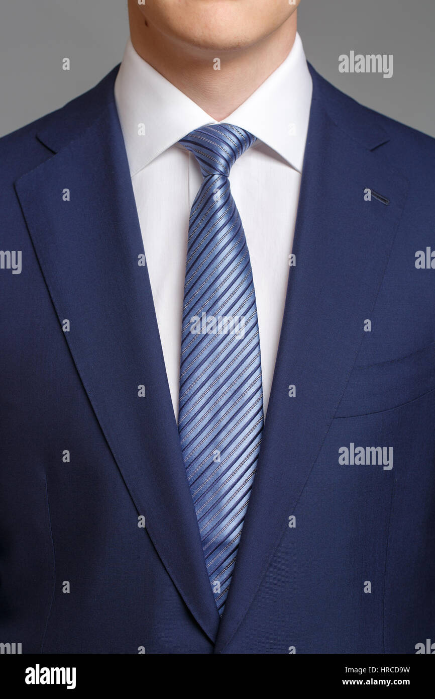 white shirt blue tie