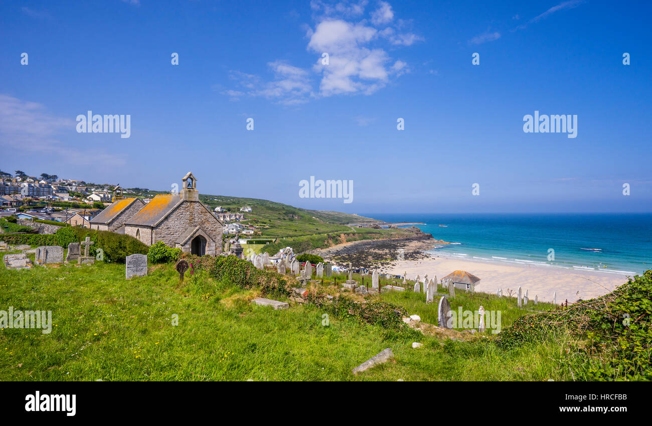 United Kingdom, Cornwall, St Ives, Barnoon Cemetary and Chapel with view of Porthmeor Beach Stock Photo