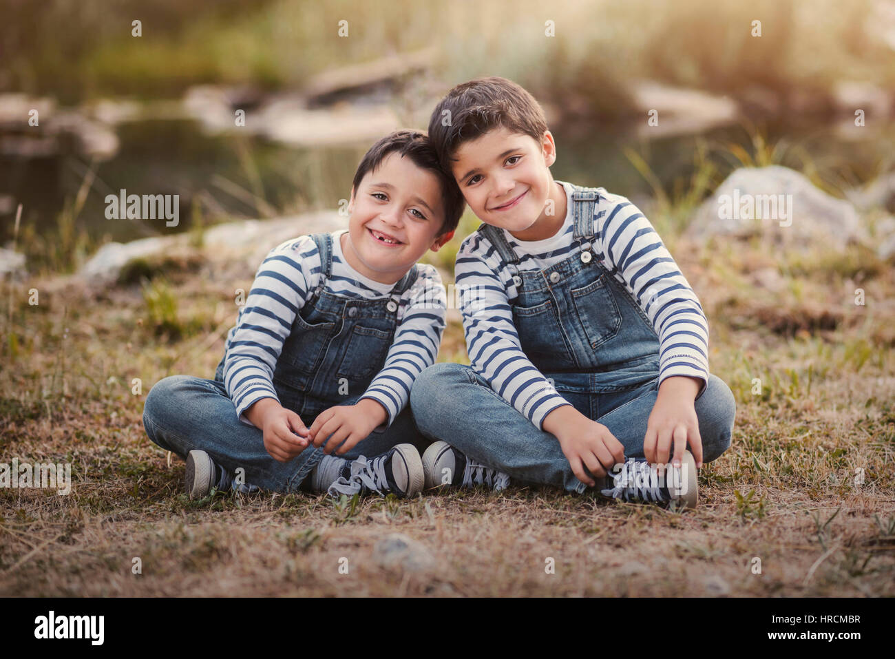 Happy brothers in the field Stock Photo