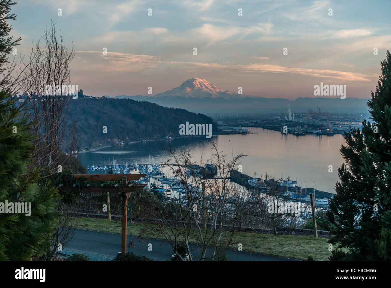 A view of the Port of Tacoma and Mount Rainier at sunset Stock Photo ...