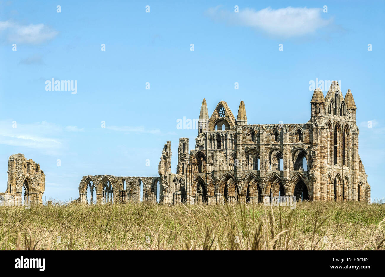 Whitby Abbey is a ruined Benedictine abbey overlooking the North Sea on the East Cliff above Whitby in North Yorkshire, England Stock Photo
