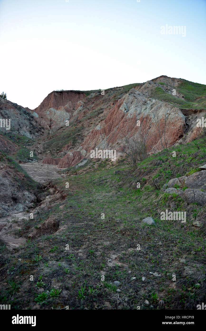 Badlands of clay soil in the upper valley of the river Secchia Sassuolo ceramic production area Stock Photo
