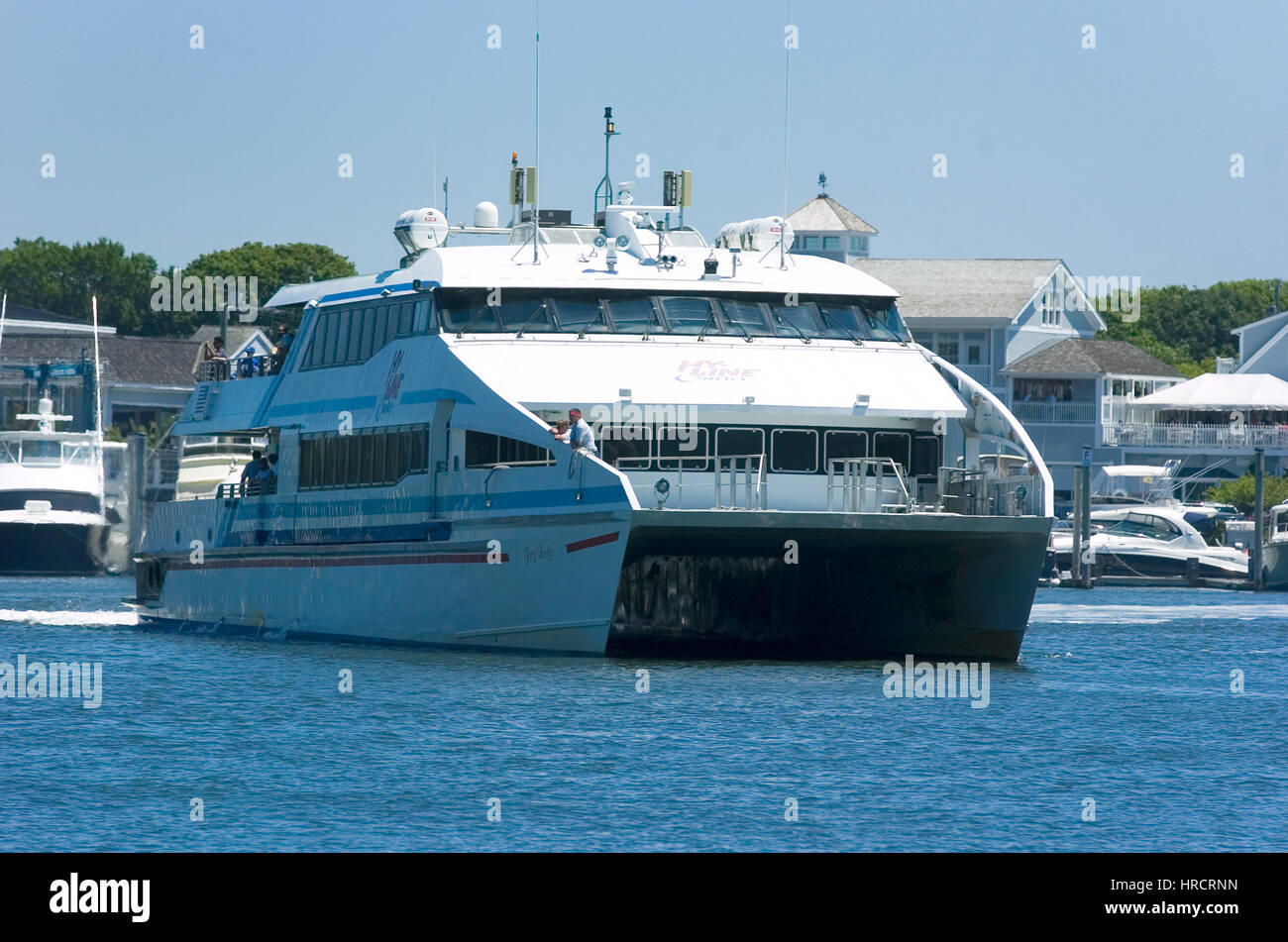 A high speed ferry boat returning to Hyannis harbor on Cape Cod from the  island of Martha's Vineyard Stock Photo - Alamy