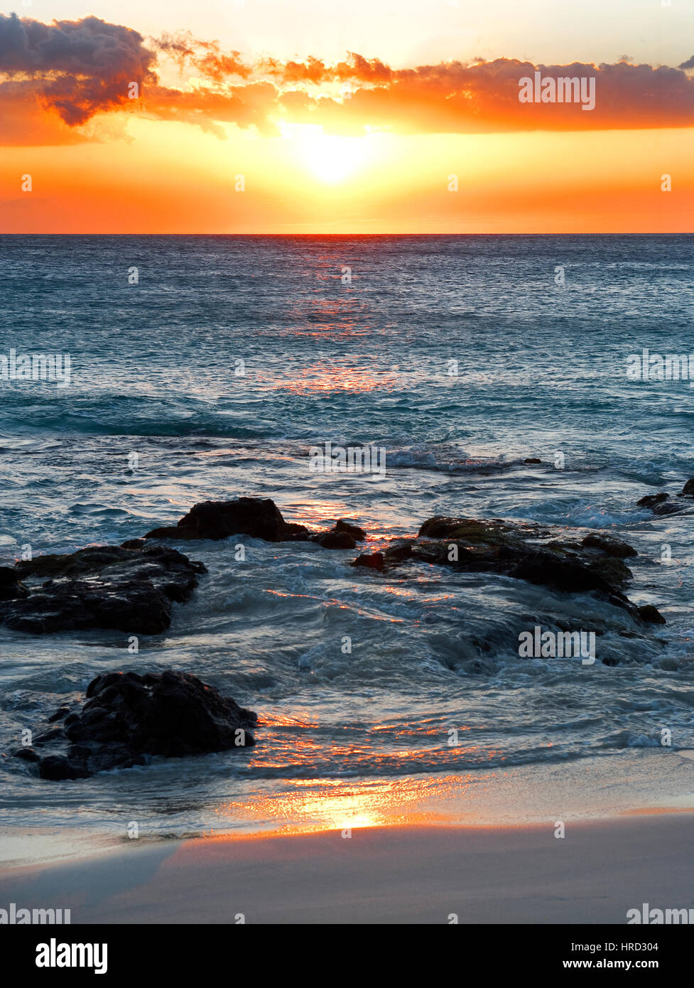 Sunset, Surf and Beach, Hawaii Stock Photo - Alamy
