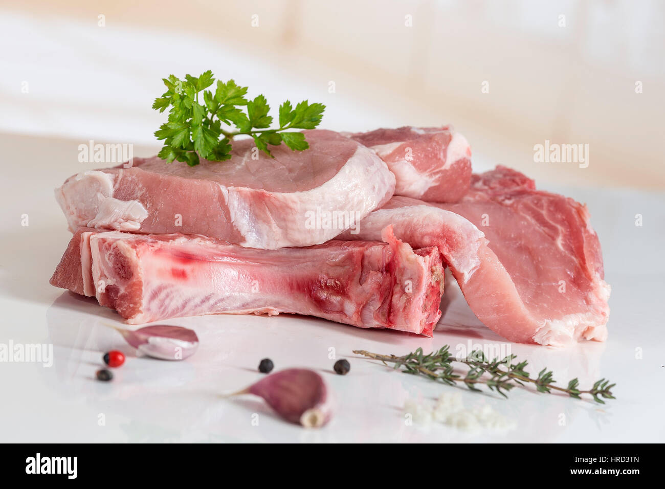 raw pork cutlet meat isolated on white Stock Photo - Alamy