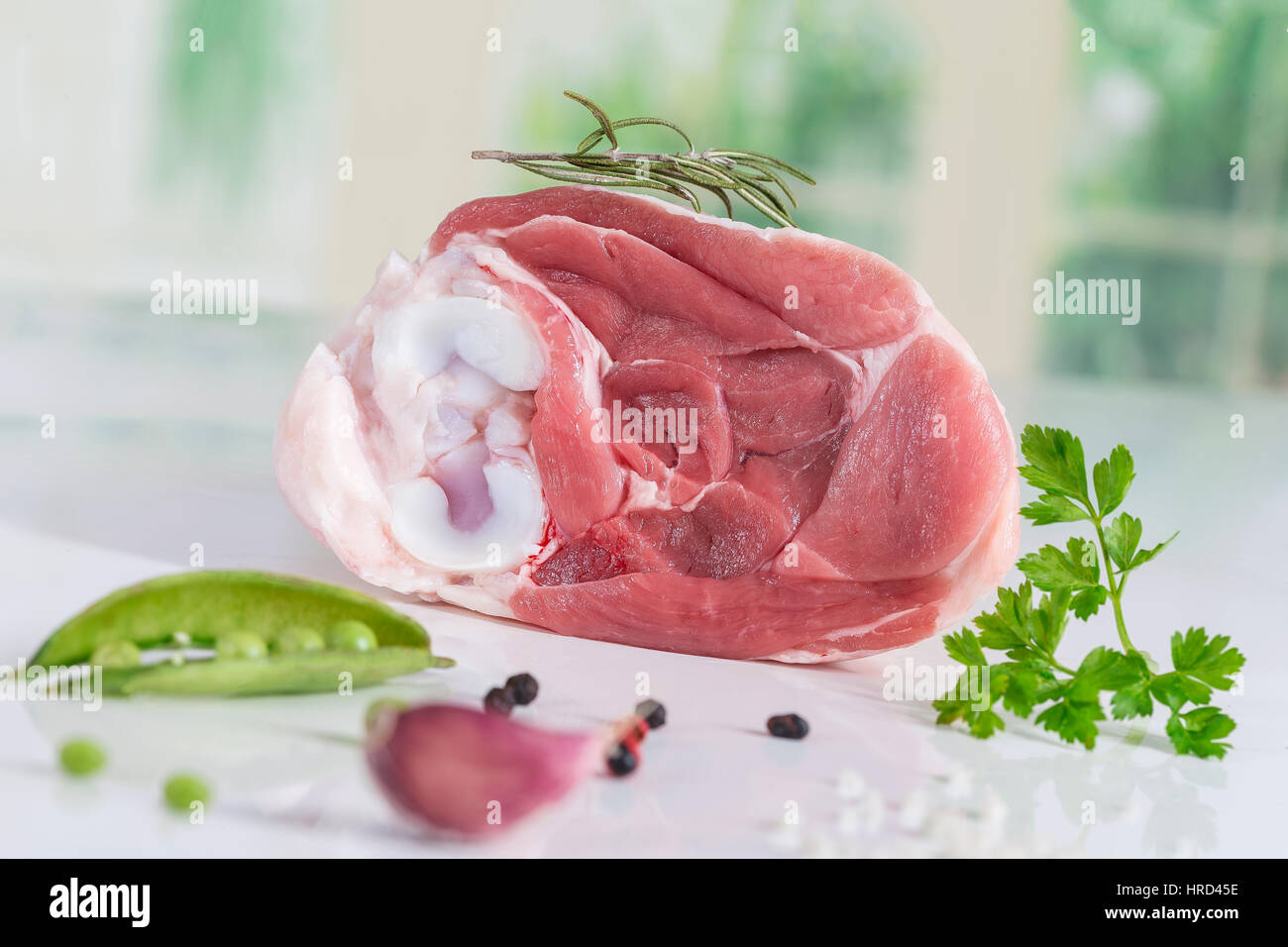 Uncooked organic hock of lamb meat in kitchen Stock Photo