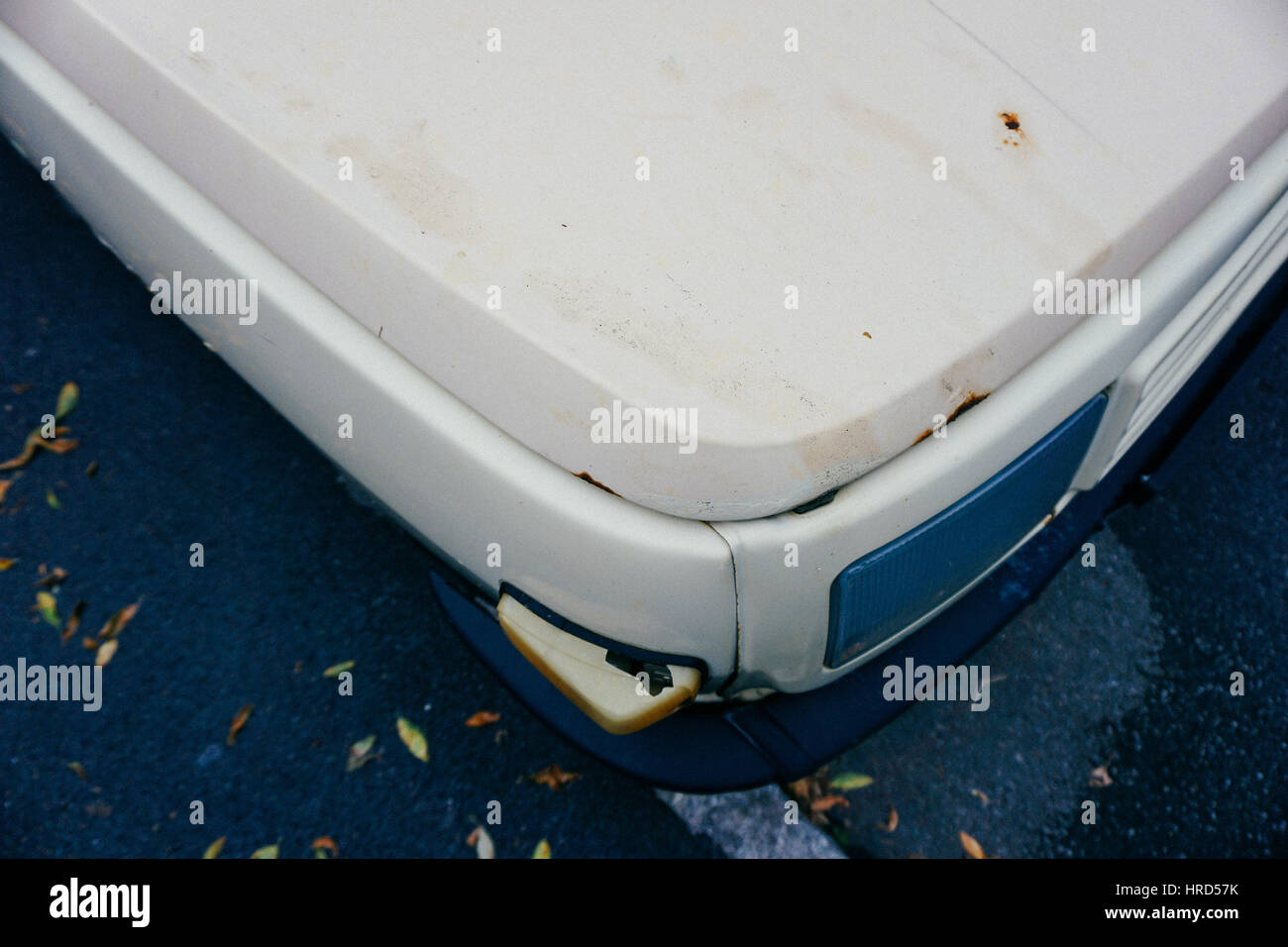 The front quarter panel of an old white car Stock Photo Alamy