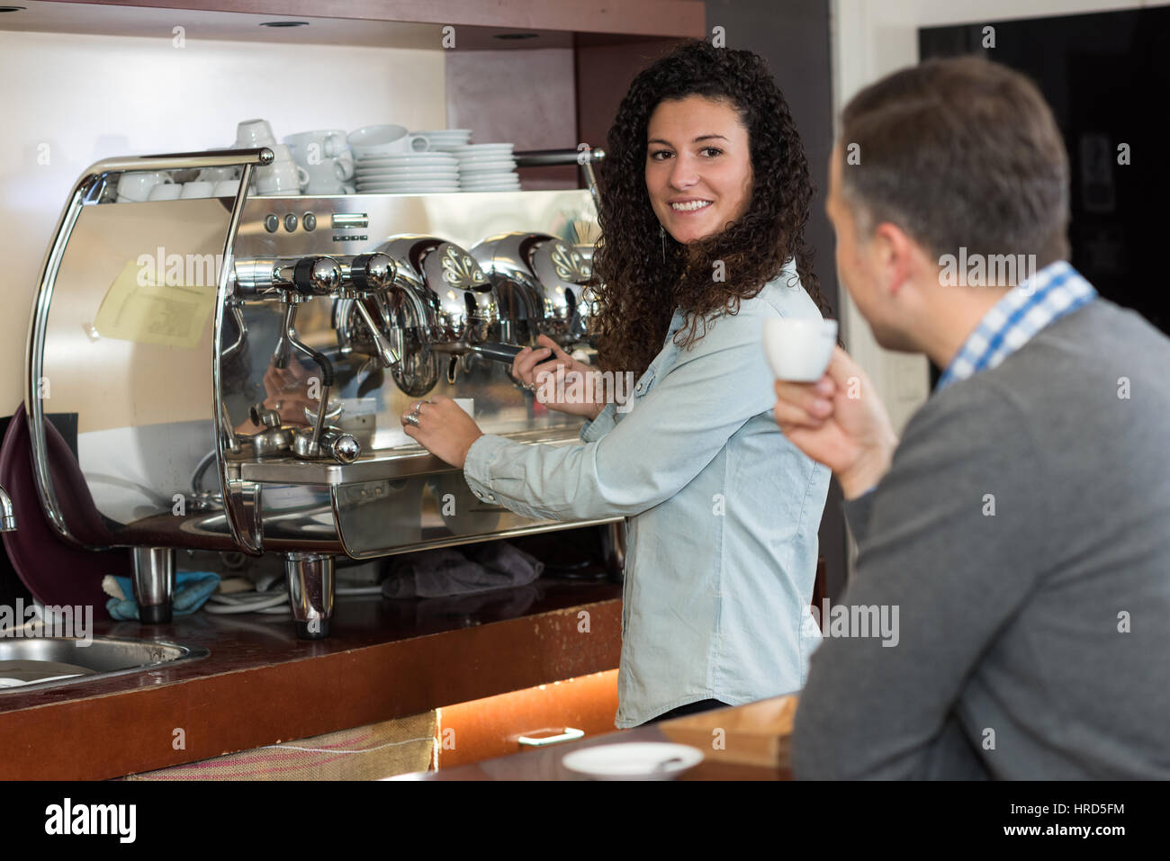 pausing for a cup of coffee Stock Photo