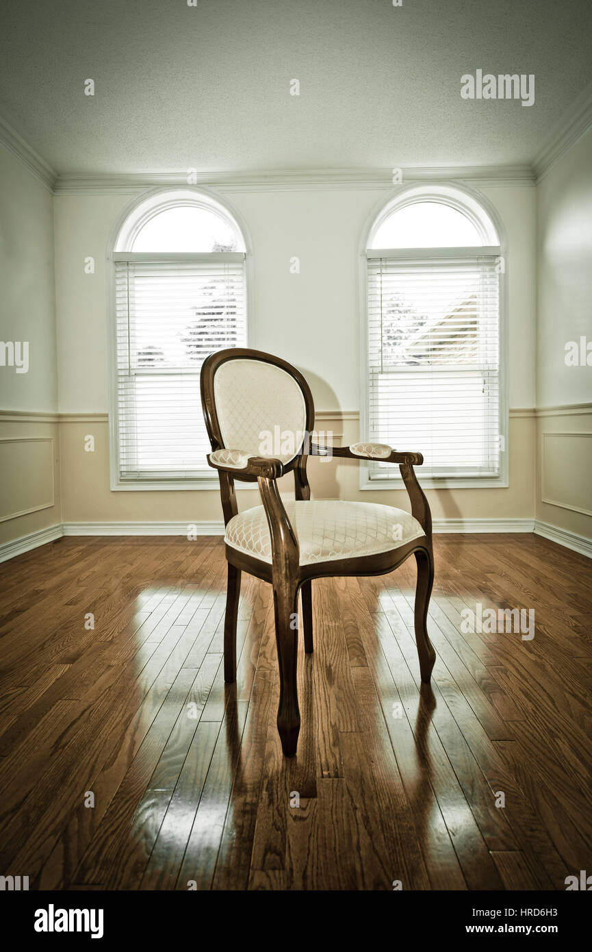 empty chair in an empty room Stock Photo Alamy