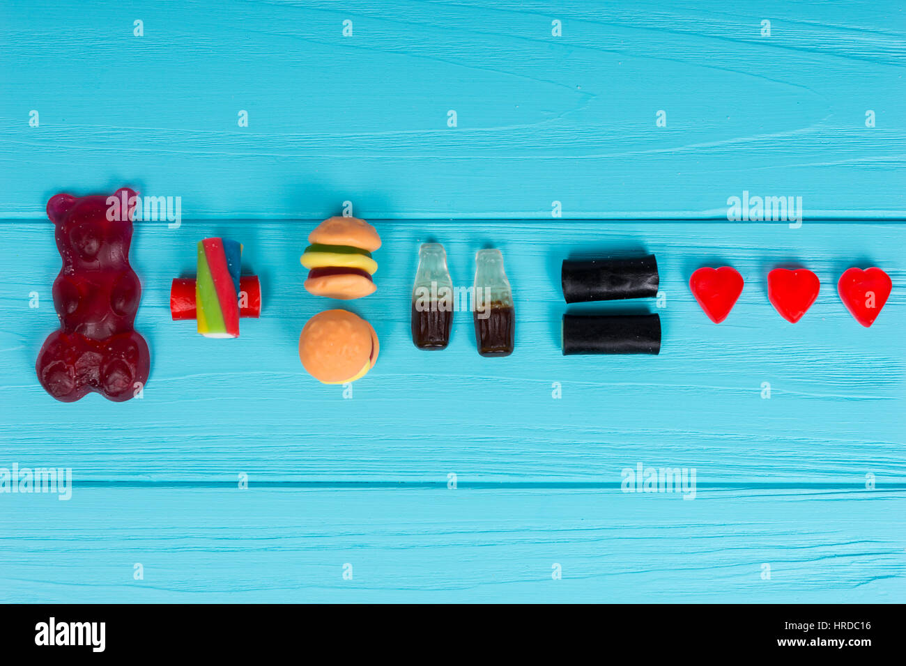 Delicious candies represent in the form of a gummy bear, burger and