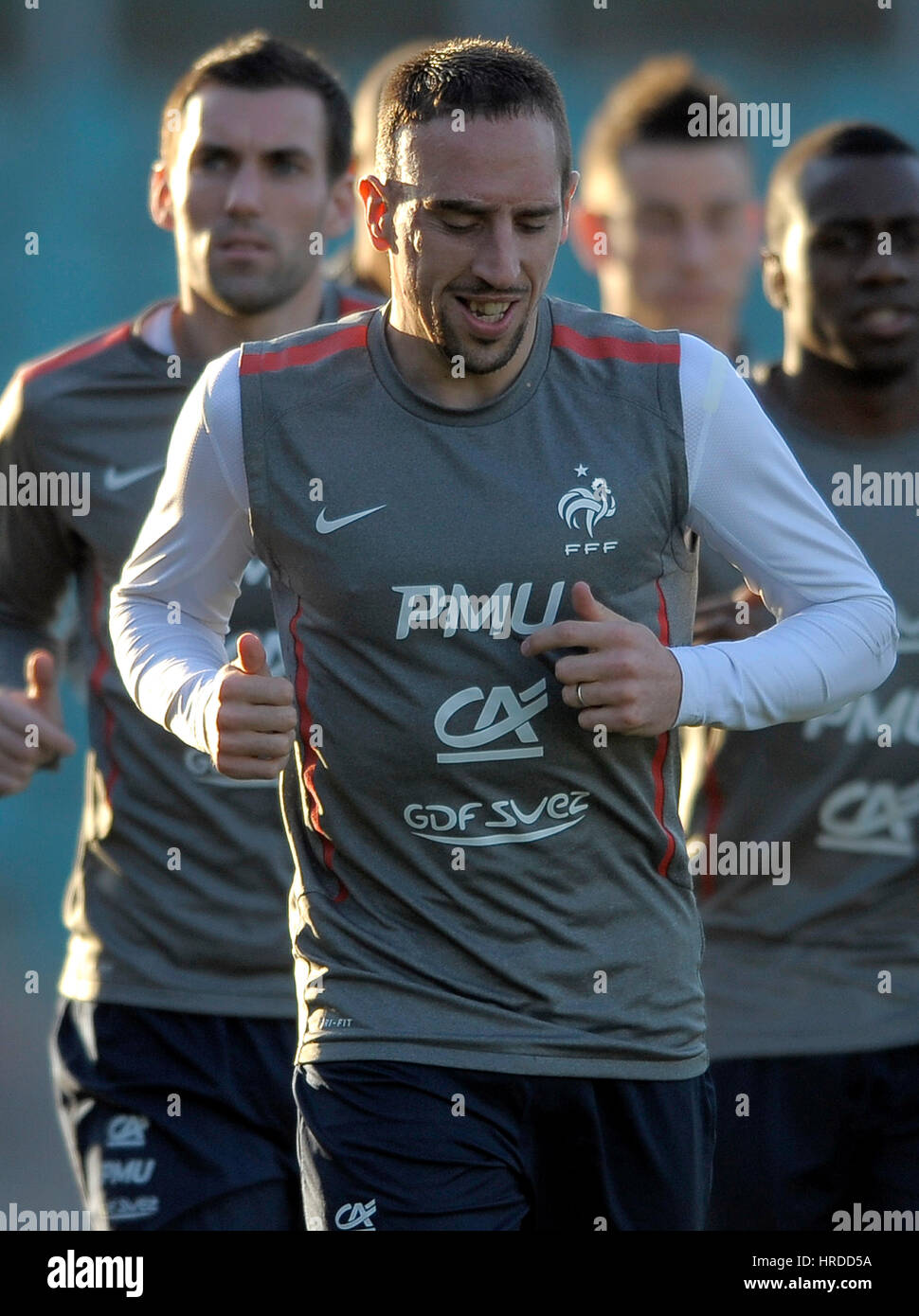 20110324: LUXEMBOURG, LUXEMBOURG : French national soccer team players Franck Ribery (front) during a training session at the Josy Barthel stadium, in Stock Photo