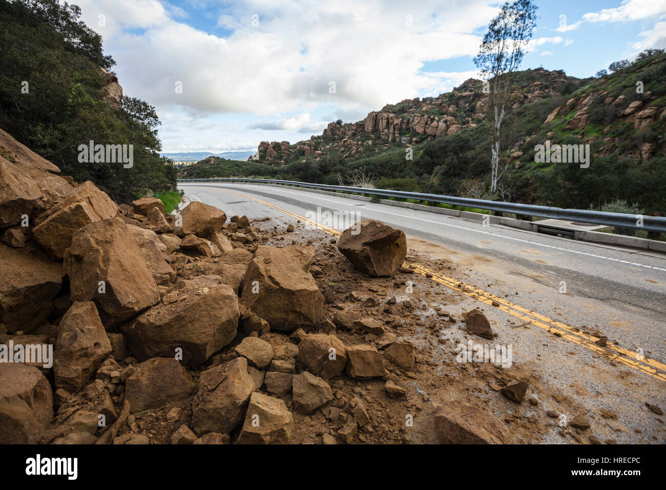 Rock slide blocking Santa Susana Pass Road in the west San Fernando Valley area of Los Angeles, California. Stock Photo