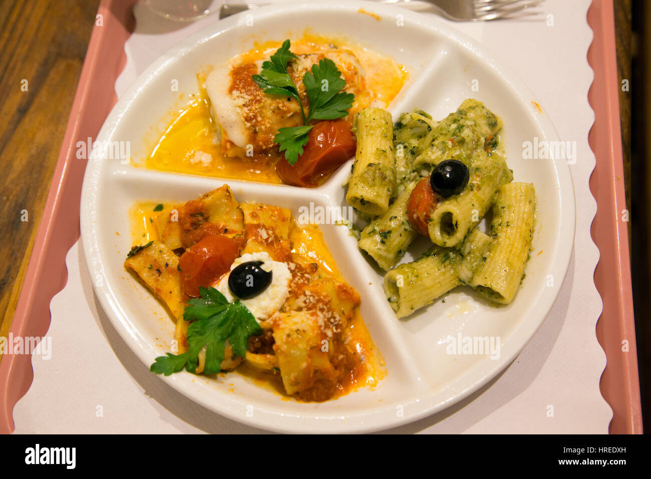 A plate with three different pasta dishes in Florence Italy Stock Photo