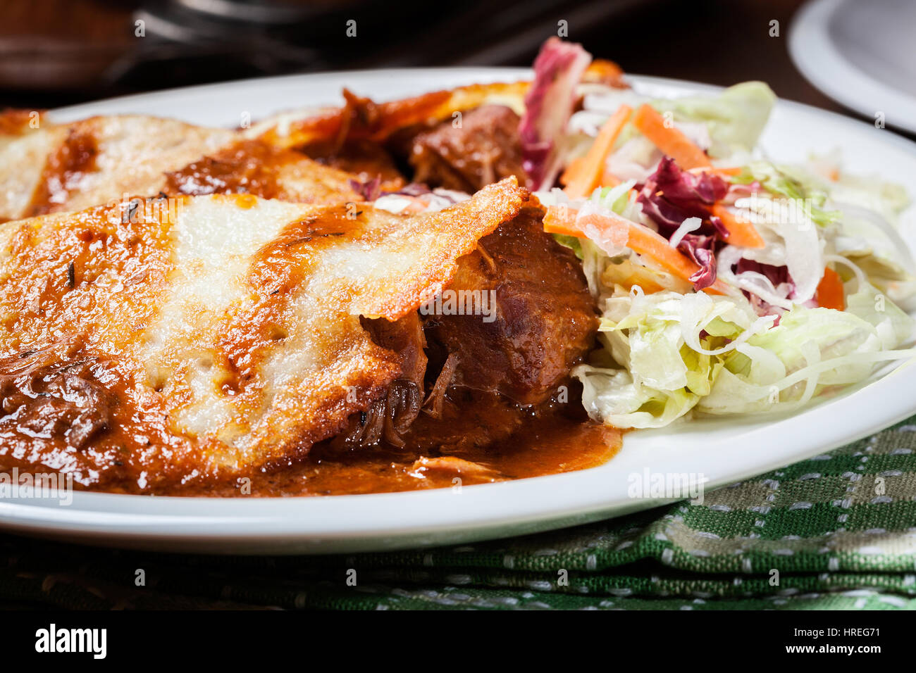 Potato pancakes with meat stew served on a plate Stock Photo