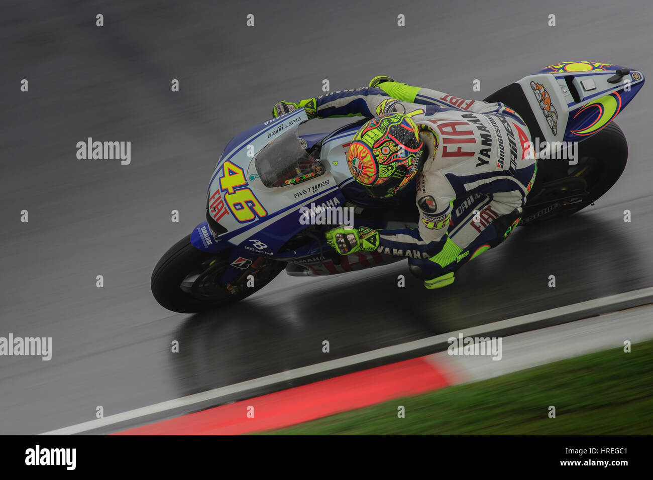 Valentino Rossi is a 9-time World Champion during the race in Sepang International Circuits. Stock Photo