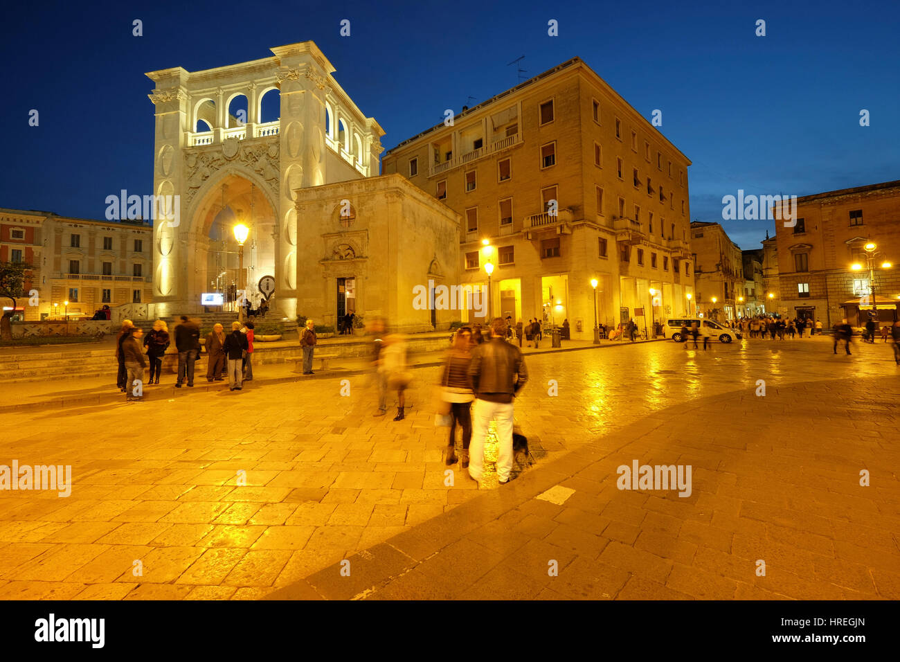 People wandering around Sant Oronzo square, early evening Lecce, Puglia, Italy Stock Photo