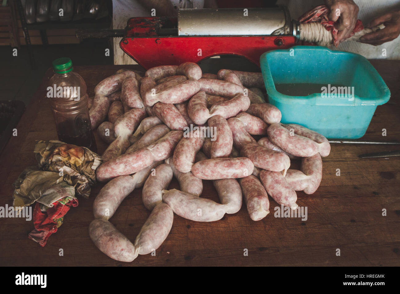 Sausage making in a slaughterhouse in Alba, which is located in the province of Piedmont, Italy. Stock Photo