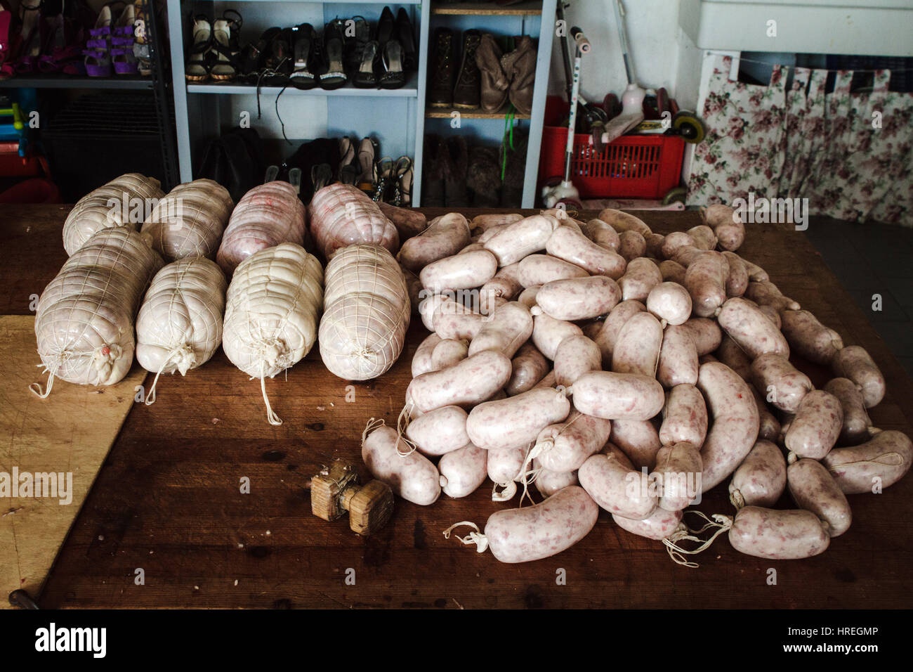 Sausage making in a slaughterhouse in Alba, which is located in the province of Piedmont, Italy. Stock Photo