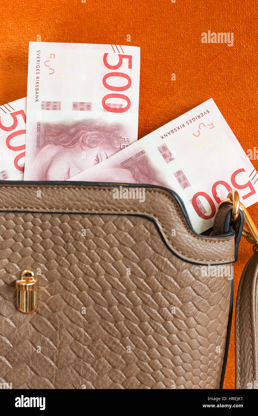 Swedish 500 kr bills in handbag. Stock Photo