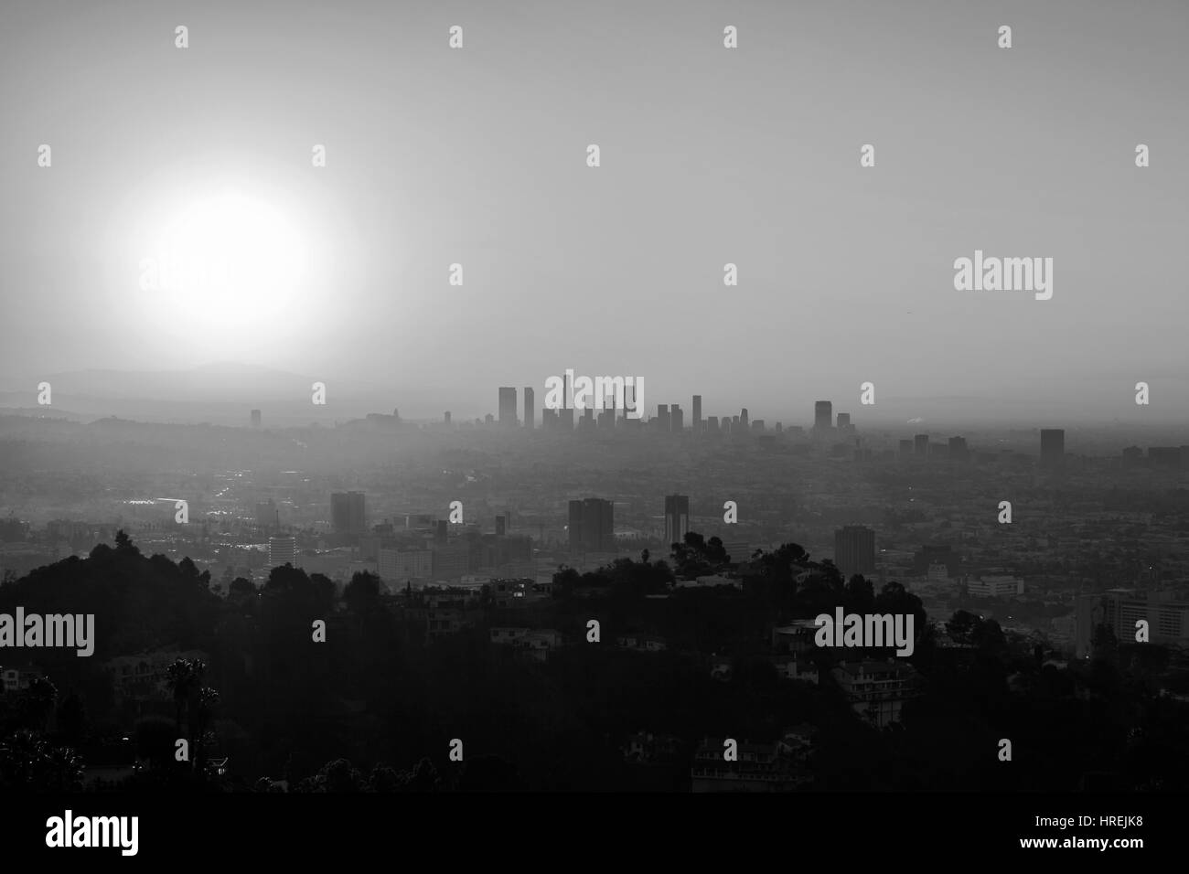 Los Angeles, California, USA - January 1, 2015:  Smoggy morning in Hollywood and Downtown Los Angeles in black and white. Stock Photo