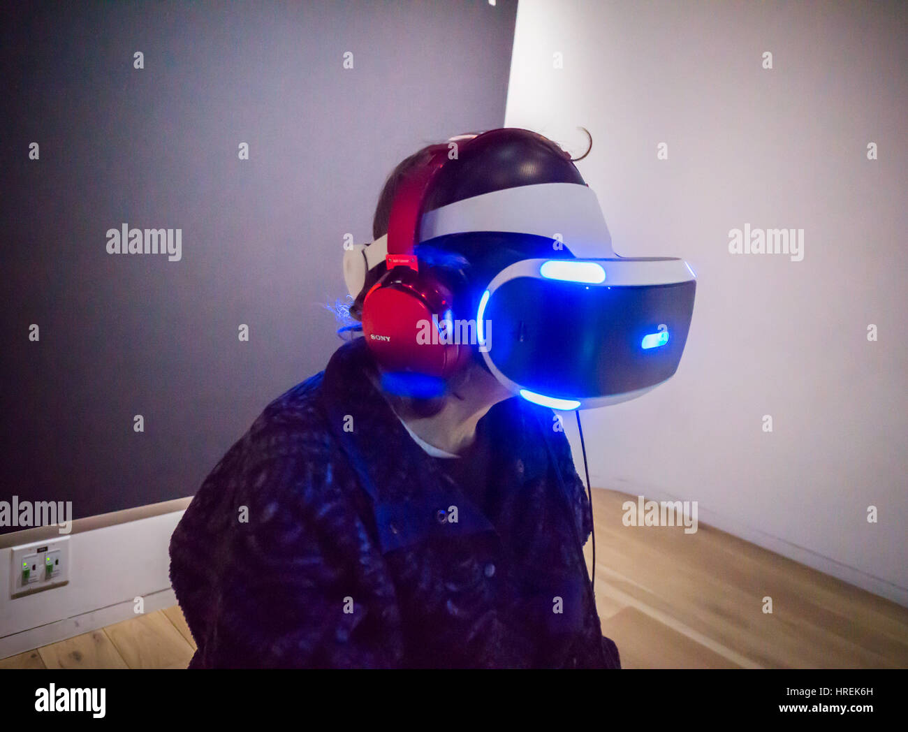 A visitor to Sony Square in New York on Monday, February 27, 2017 tries out the Sony Playstation VR virtual reality headset. The headset, an add-on to existing Playstation 4 consoles, has been very popular due to the existing market of Playstation owners. (© Richard B. Levine) Stock Photo