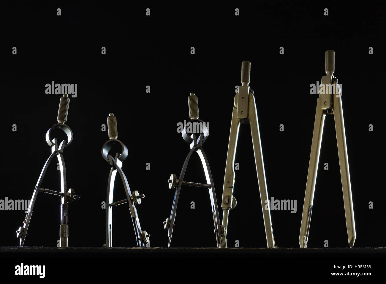 Kern mechanical drawing instruments at low angle against black