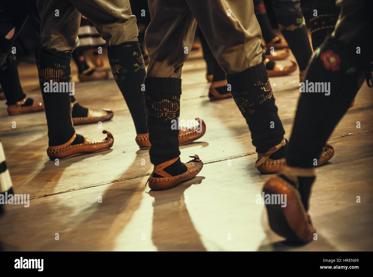 Abstract composition showing legs dressed in Serbian traditional clothe dancing in folklore. Stock Photo