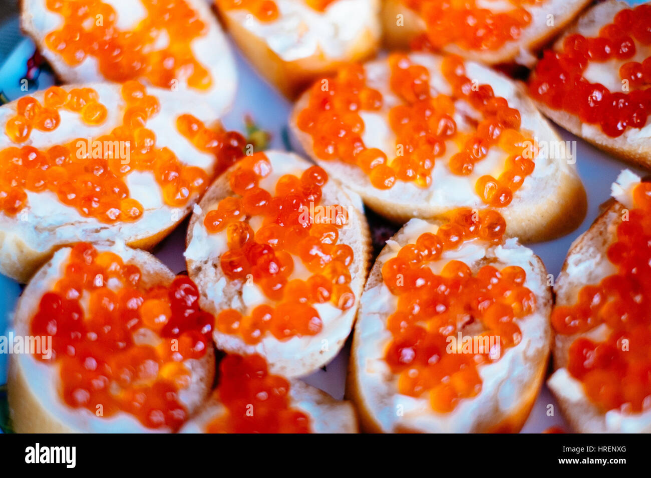 bread and butter with red caviar Stock Photo Alamy