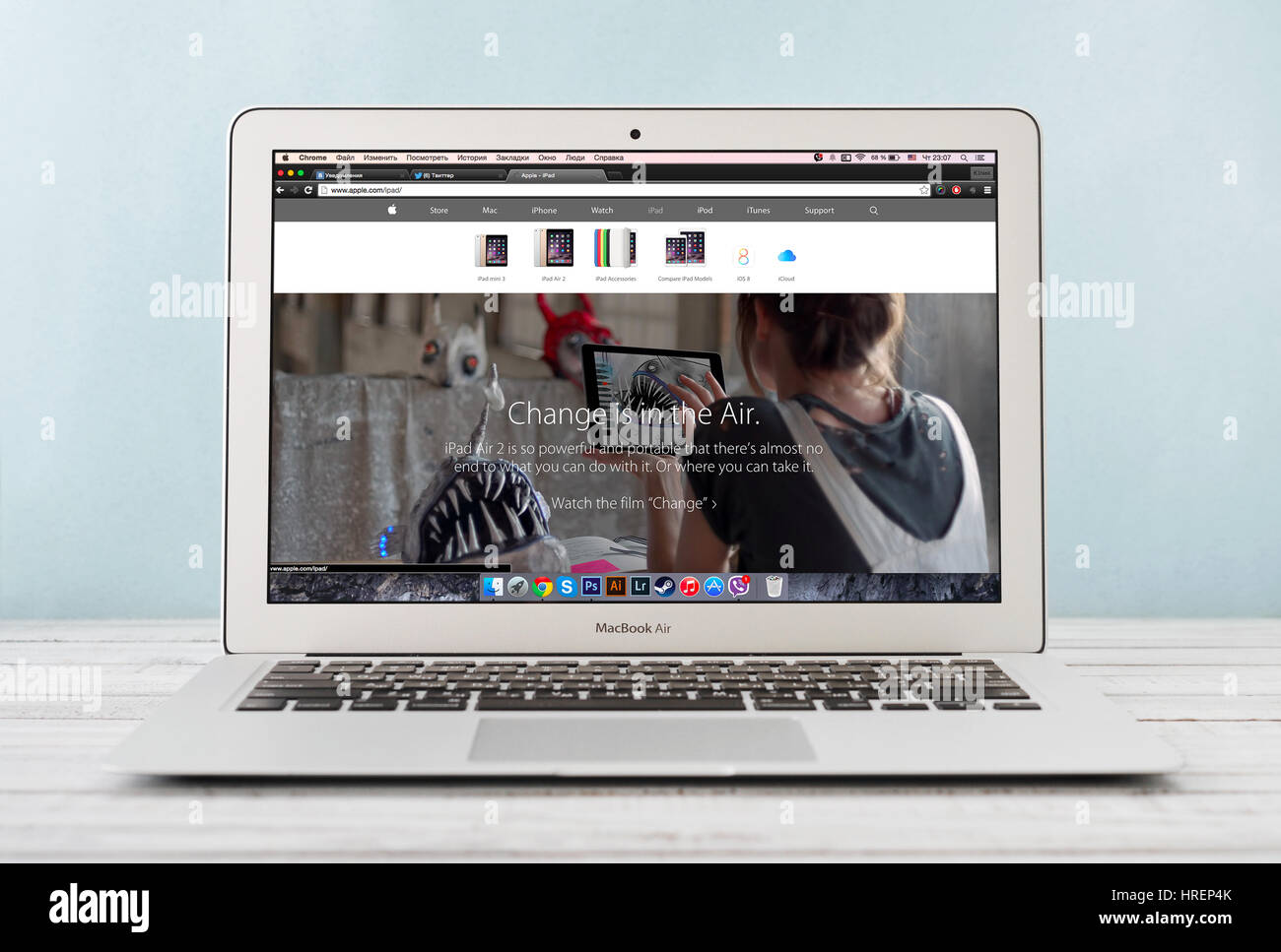 KIEV, UKRAINE - JANUARY 29, 2015: Brand new Apple MacBook Air Early 2014 with home page of Apple Inc. site presenting new iPad Air 2 on screen, design Stock Photo