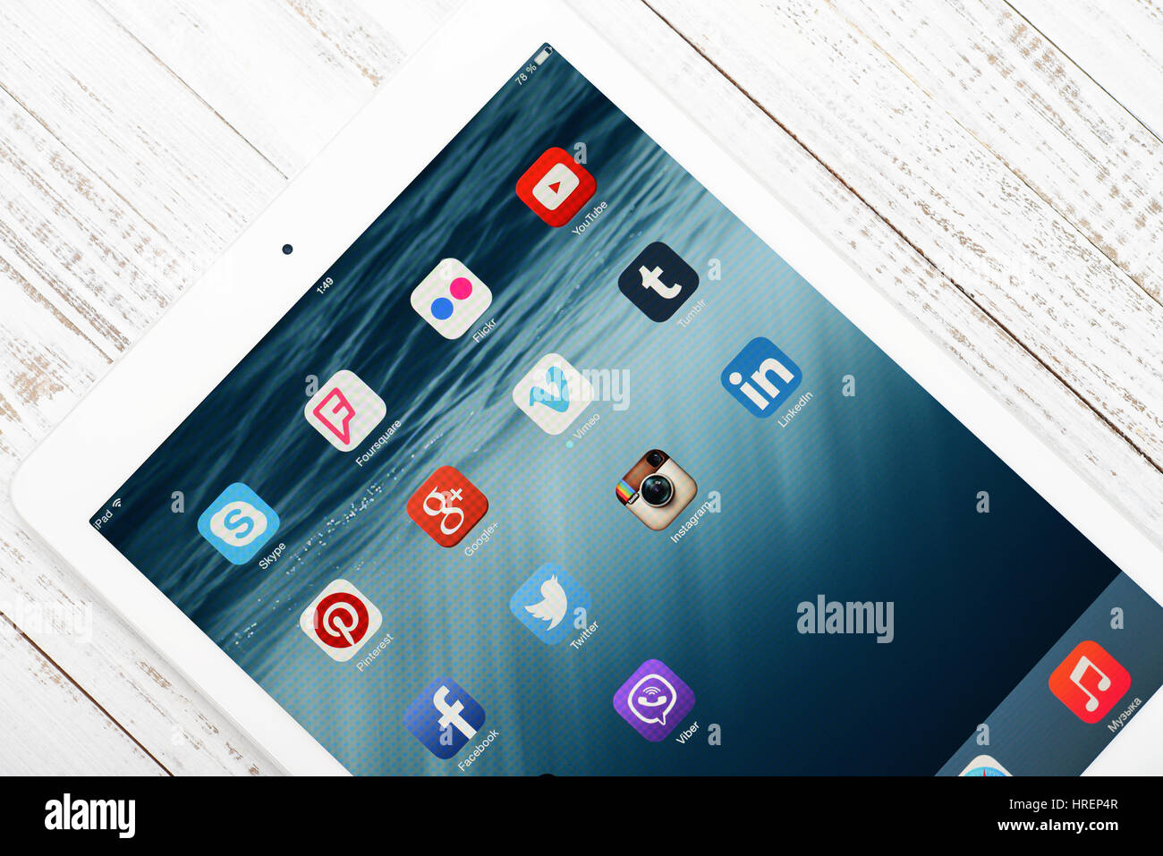 KIEV, UKRAINE - JANUARY 29, 2015: Social media icons on screen of iPad Air closeup. Social media are most popular tool for communication, sharing info Stock Photo
