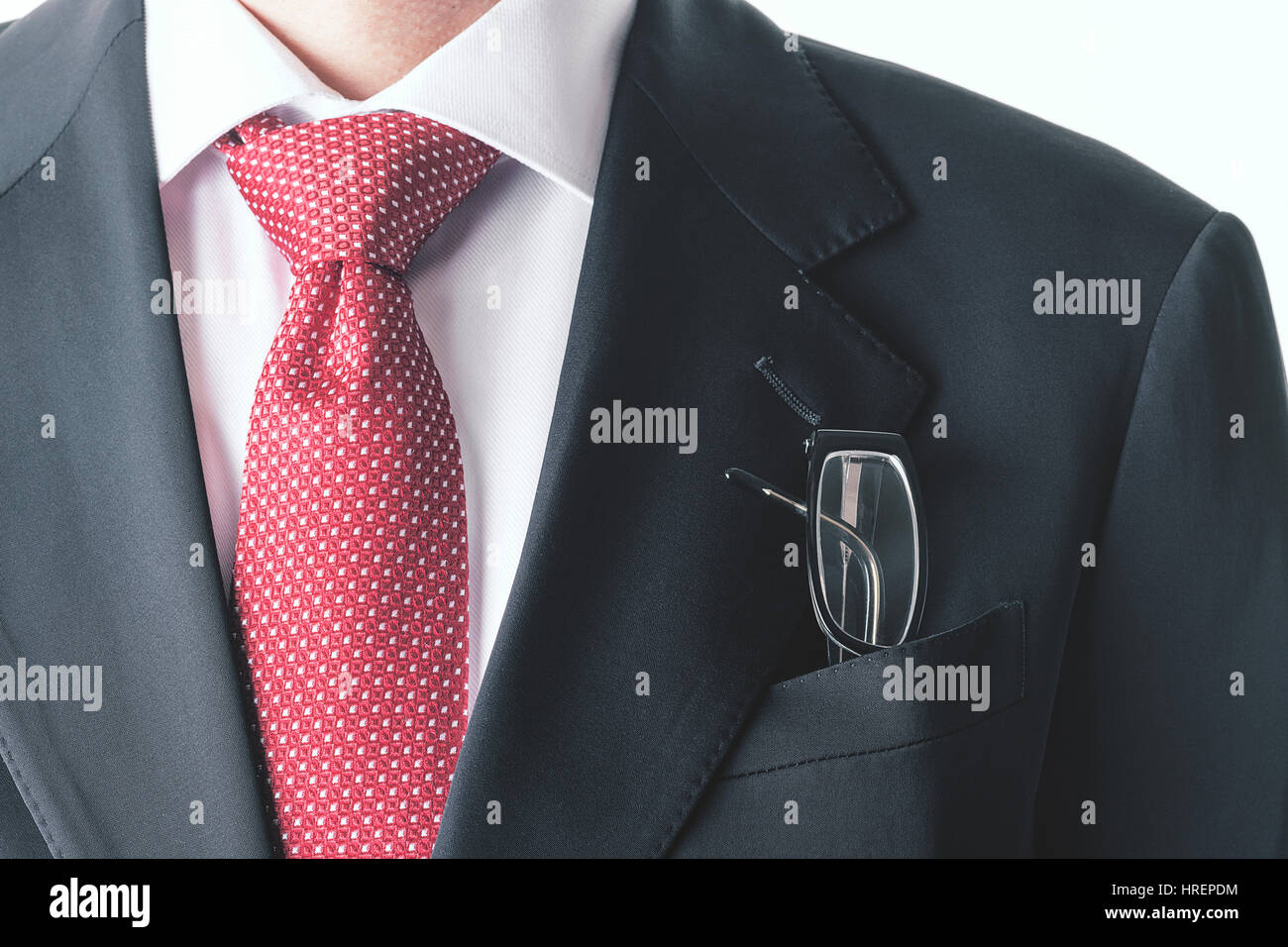 businessman. A business man keep glasses His suit pocket Stock Photo