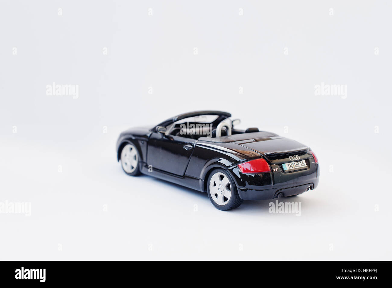 Hai, Ukraine - March 1, 2017: Mini copy of red toy car Audi TT convertible  isolated on white background Stock Photo - Alamy