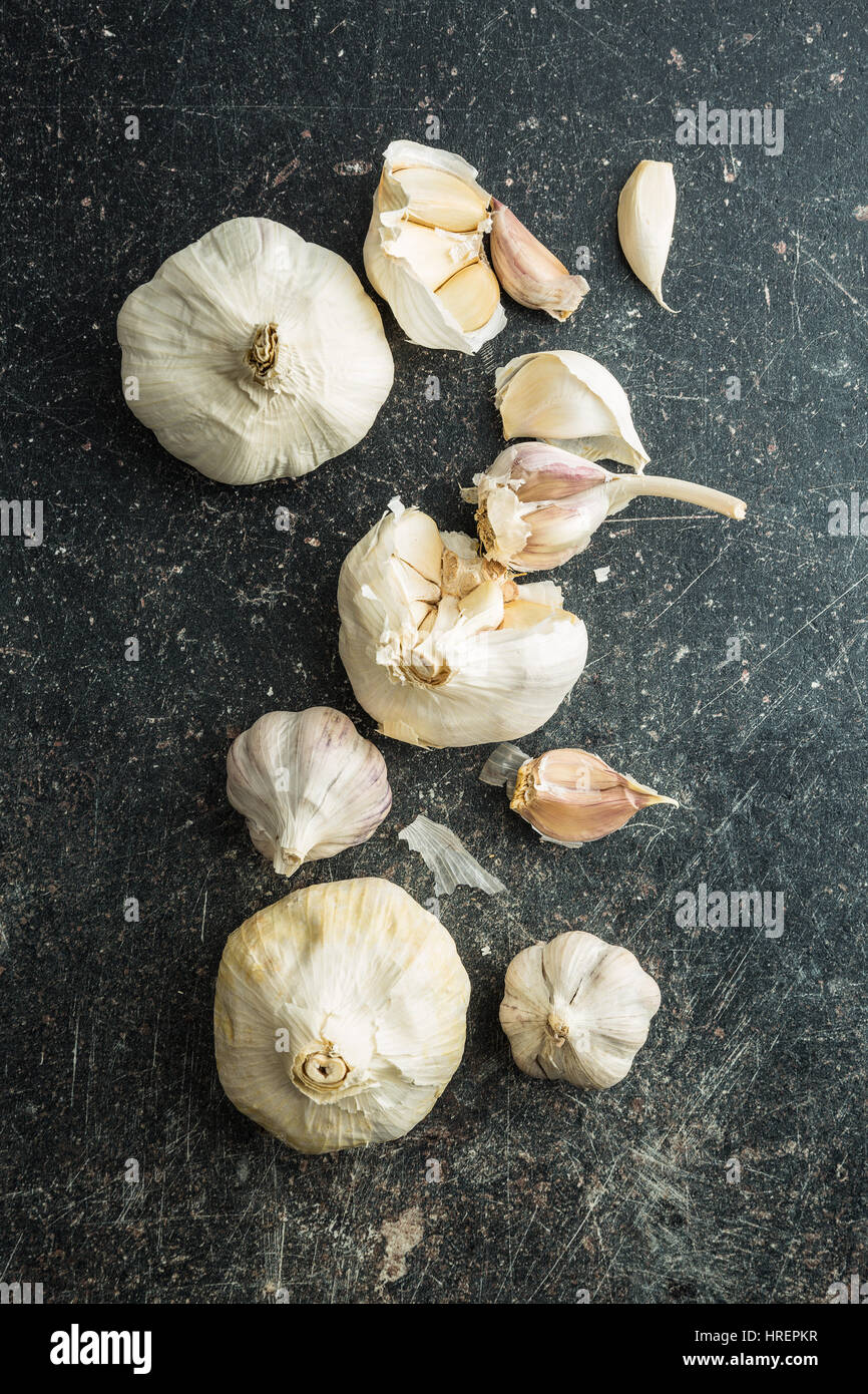 Fresh garlic on kitchen table. Top view. Stock Photo
