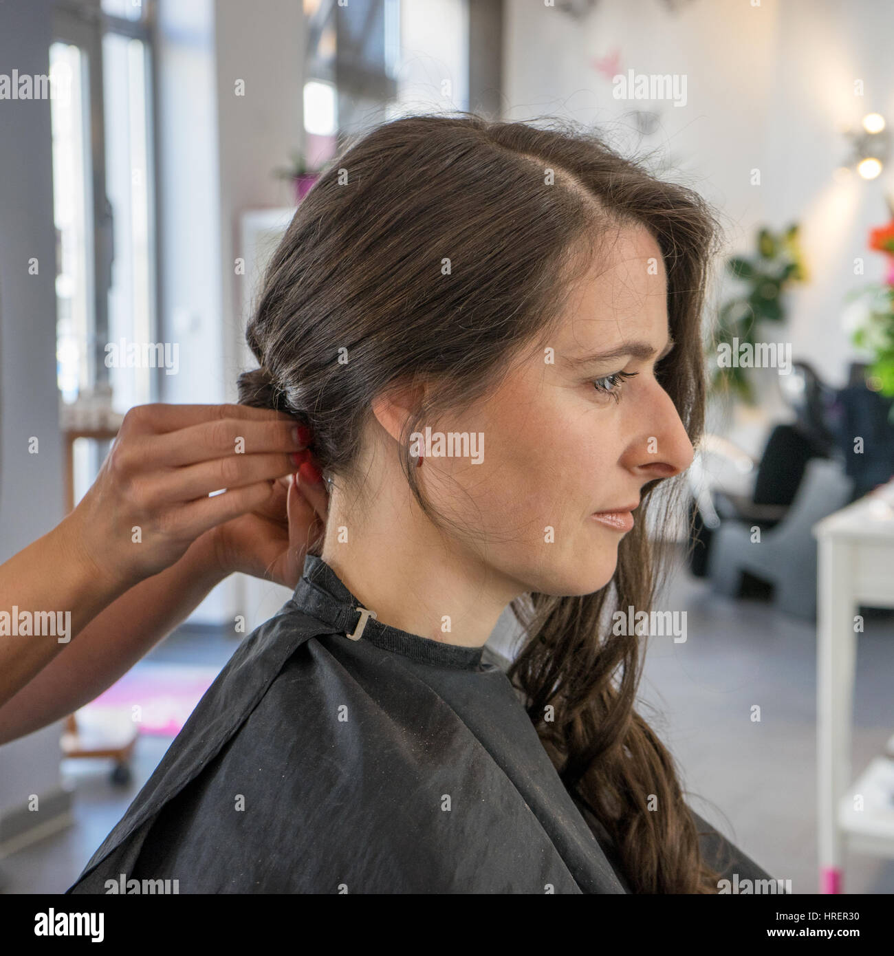 A beautiful woman in a hair salon Stock Photo
