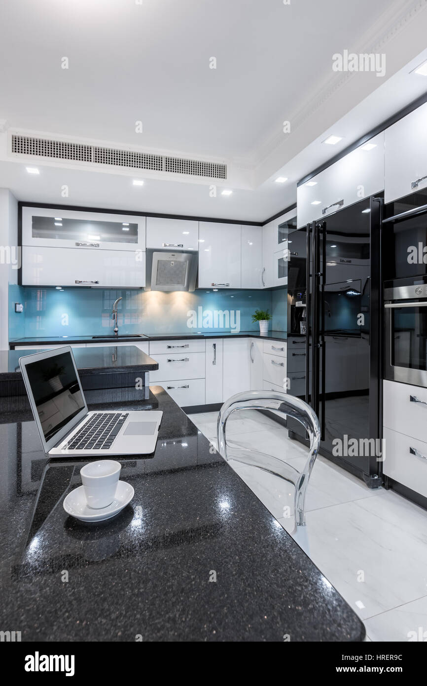 Comfortable place to work combined with modern kitchen interior Stock Photo