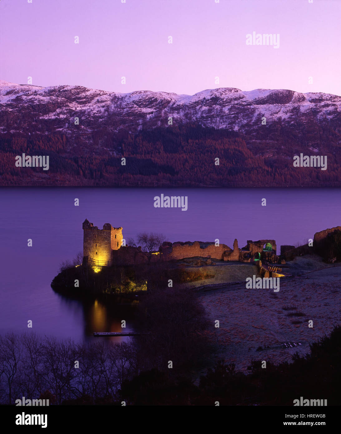 Dusk falls over the ruins of Urquhart Castle, Loch Ness, Inverness-shire Stock Photo